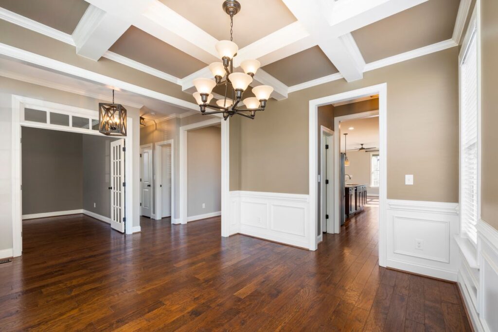 Finished room with elegant wainscoting and accent wall trim