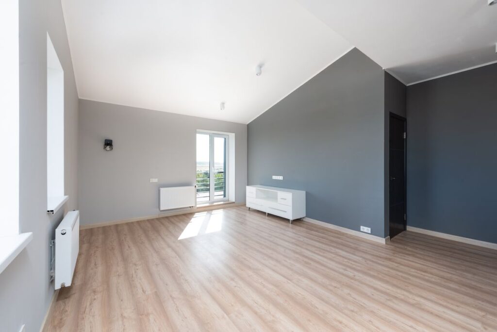 Bright, freshly painted room with clean walls and natural light